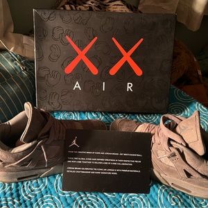 Nike Air Jordan 4 Retro x KAWS Cool Grey 2017 $825